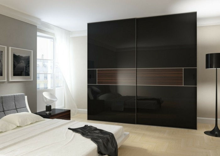 porte-proprio-build-con-elegante-nero-design-in-moderno camera da letto di scorrimento