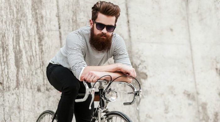 baard kleurstof huis agent hipster stijl man met fiets en lange baard bruine baard bril