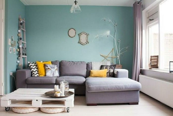 hörnsoffa-in-grå-färg attraktiv design-vägg färg blå
