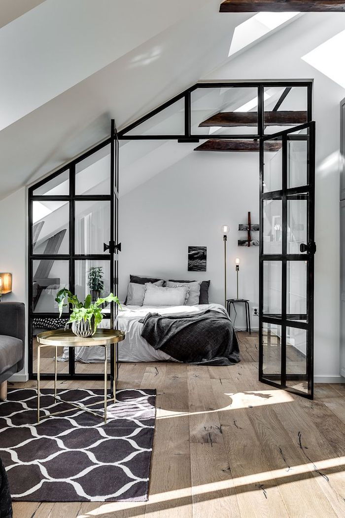 penthouse lägenhet exempel svart vit design säng sovrum