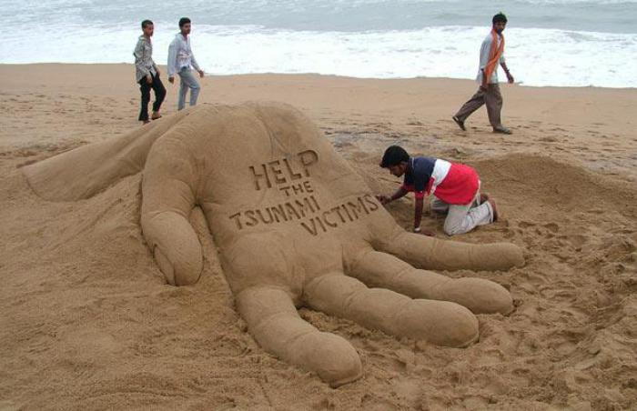moderne sculture-di-sabbia-sociali messaggio