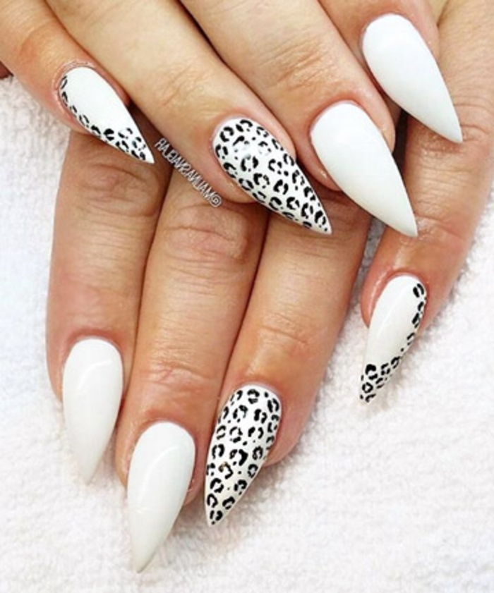 nailart pointy idéer med vit nagellack och leo tryck i svarta färgdekorationer bra för naglar