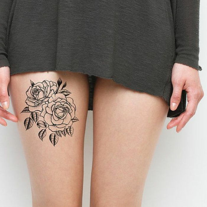 tatuagens de tatuagem pouco idéias nas coxas de rosas de uma mulher com pequenas folhas vestido verde