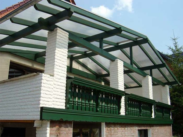 Balkon dakbedekking houtcombinatie met dubbele gespoten houten balustrades
