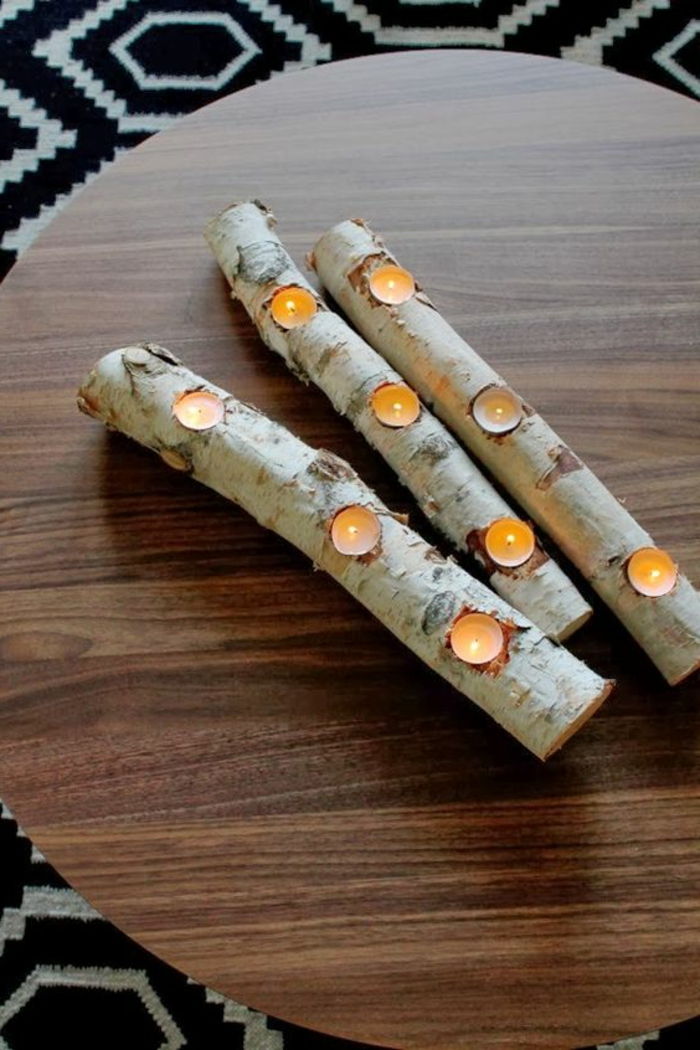 houten tafel, takken, theelichtjes, kleine kaarsen