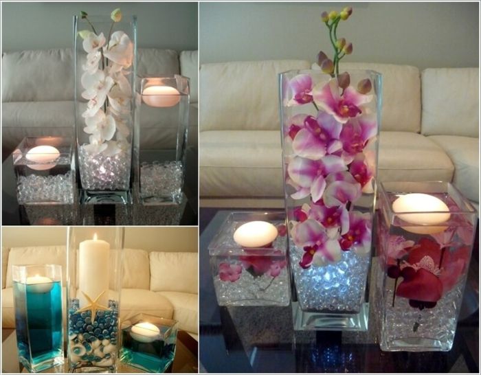 Obývacia izba dekorácie s vodnými sviečkami, dekoratívnymi kameňmi, škrupinami a kvetmi