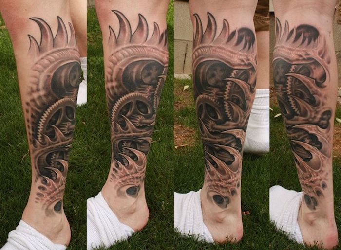 perna de tatuagem, homem com grande tatuagem com motivos biomecânicos