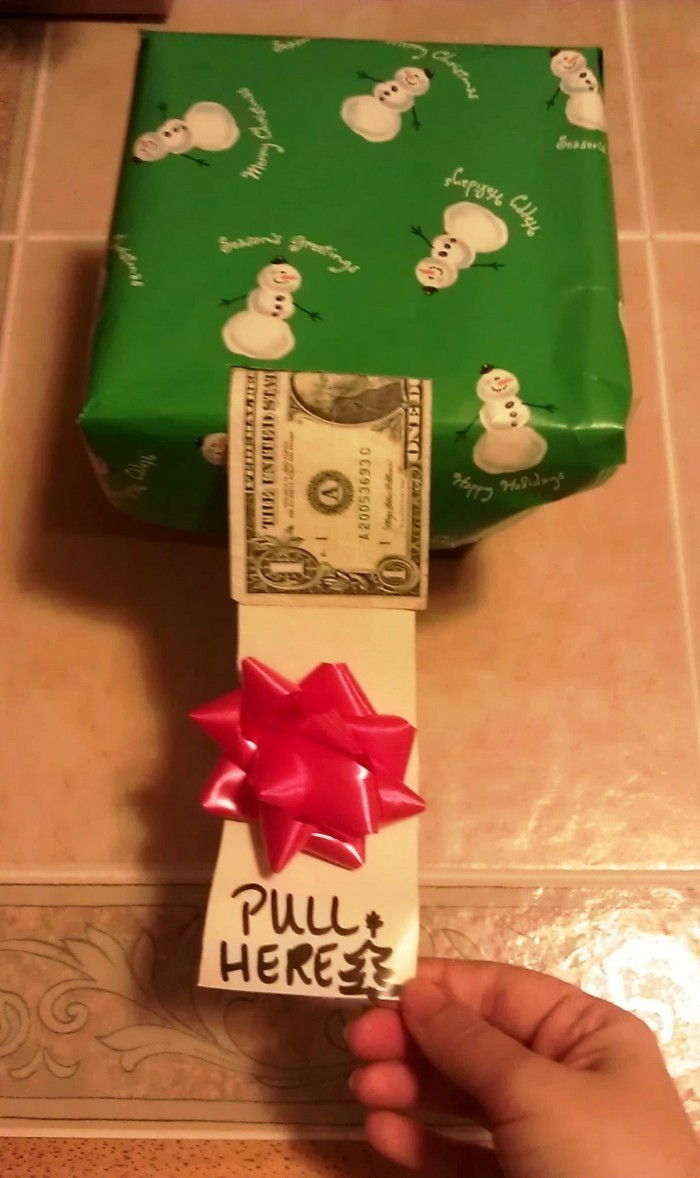 pinigų dovanos Tinker-vilkite, kad-su-žalia-packaging-