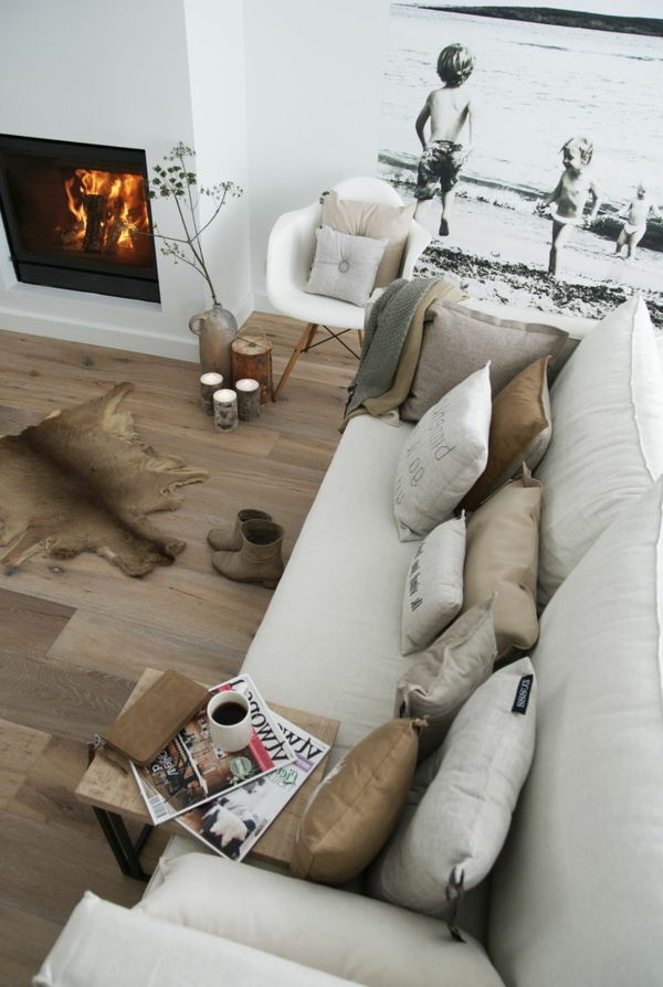 interior design idee pavimentazione-da-legno-divano in pelle tappeto