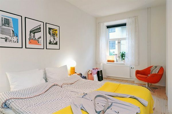 Spalnica-design-v-skandinavskem slogu rumeni barvni poudarki-v-sobi