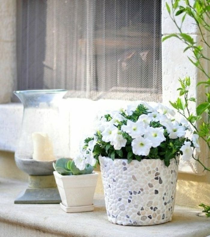 blomkrukor gör blomkrukedesign med stenar vit med grå och beige kamrat skandinavisk
