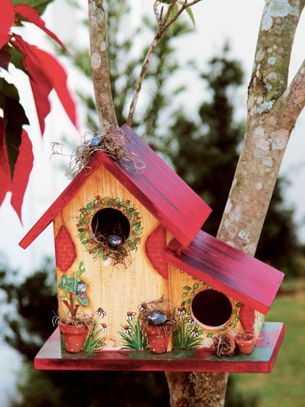 Colorful casa rivestimento per gli uccelli di legno in rosso
