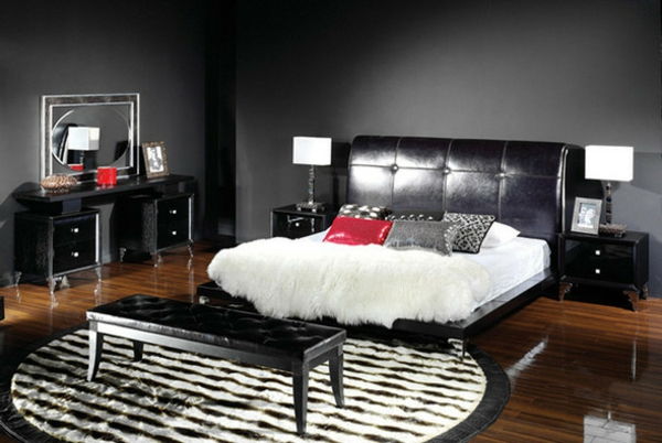 artdeco-stijl - chic bed met een zwart lederen hoofdeinde