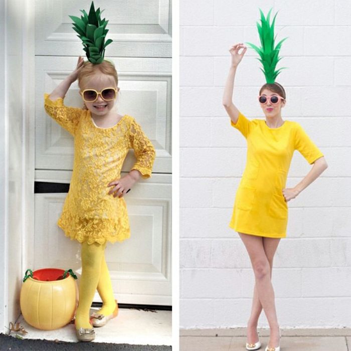 en liten jente og en kvinne kledd som ananas