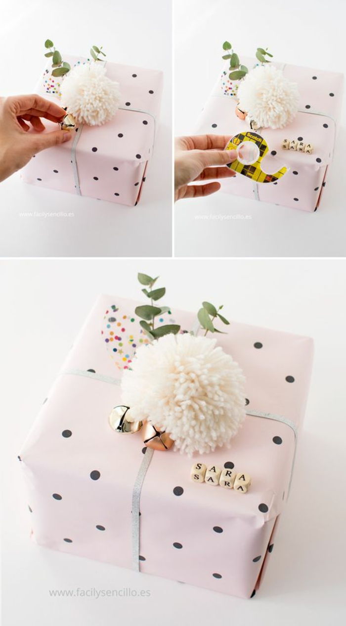 rosa emballasje ideer med pompons, klokker og stengler som en bursdag ornament