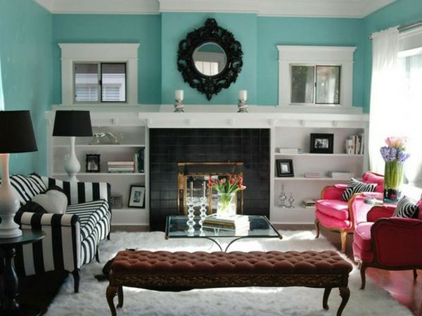 lys turkis vegg farge-stue utforming-stripete sofa-i-svart-hvitt