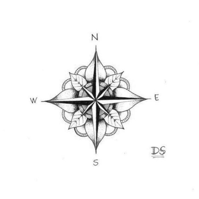 gėlės, balti lapai ir šiek tiek juodos kompaso idėja, skirta mažai elegantiškam kompaso tatuirui