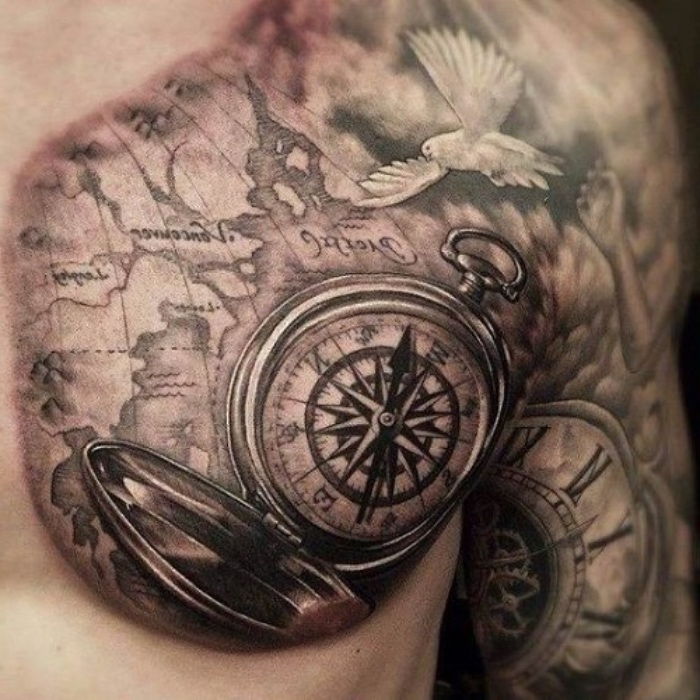 baltas balandis, didelis pasaulio žemėlapis ir didelis juodas kompasas - idėja kompaso tatuiruotė žmogui