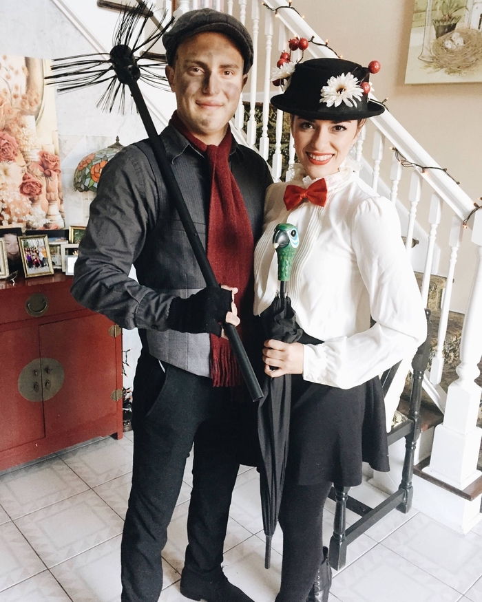 Merry Poppins in Stornsteinsteiger z dežnikom glave papiga