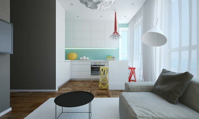 liten leilighet-set lys grå-sofa-parkett-hvitt-teppe-svart-round table-stehlampe
