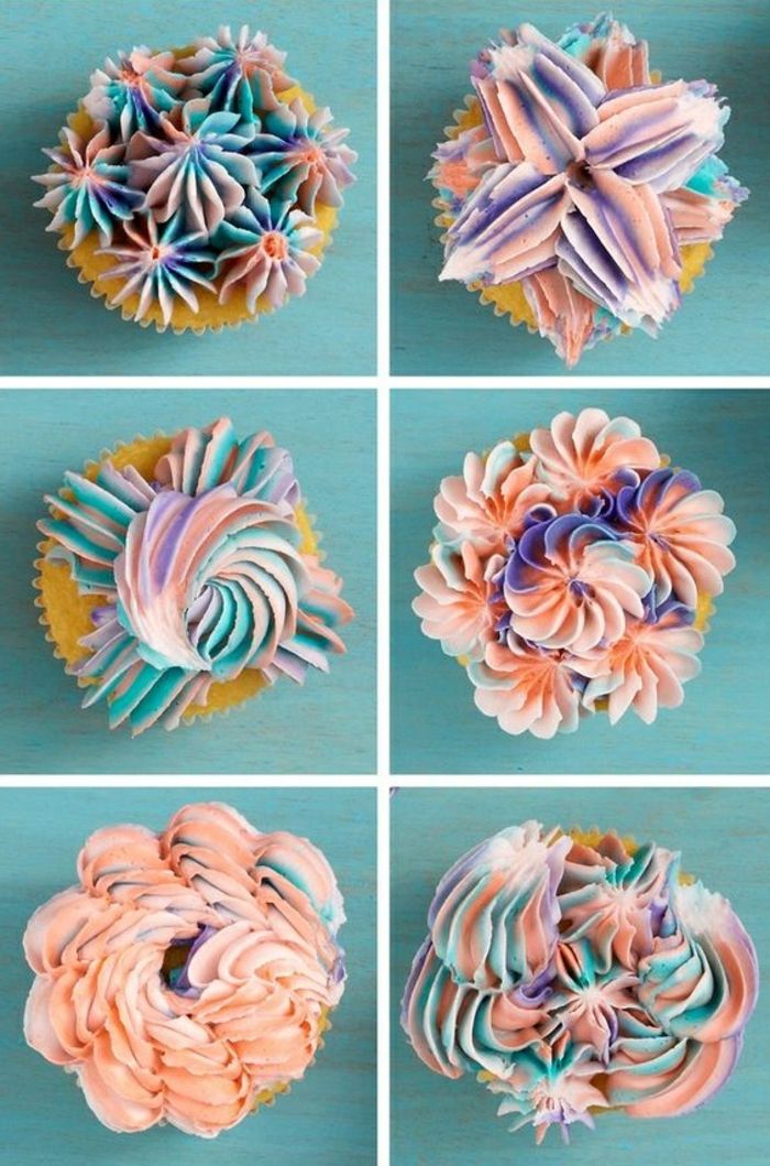Farklı renklerde krema ile dekore edilmiş kekler