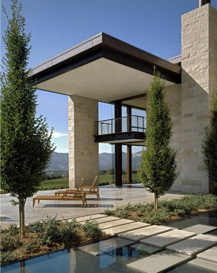 minimalistisk hus med minimalistisk hage - landskapseksempler