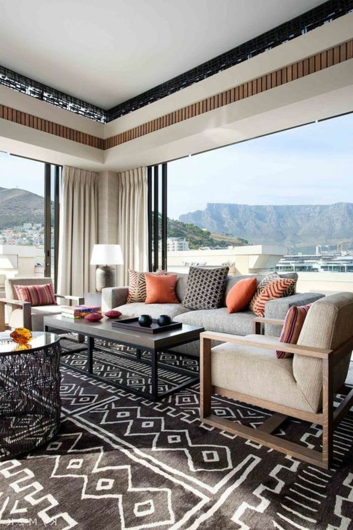 orientalske elementer i det store rommet teppe i svart og hvit sofa lenestol pute deco vindu ideer
