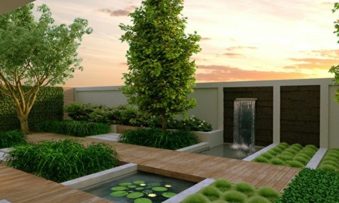en vacker vattenfunktion, damm med vattenliljor och stora träd - modern trädgård