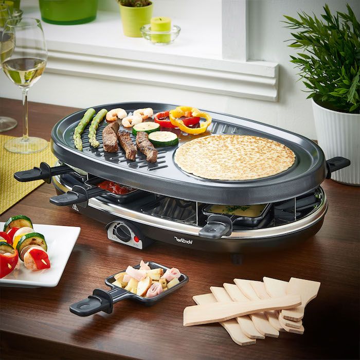 ingredienser raclette stort apparat for flere personer som forbereder mat raskt