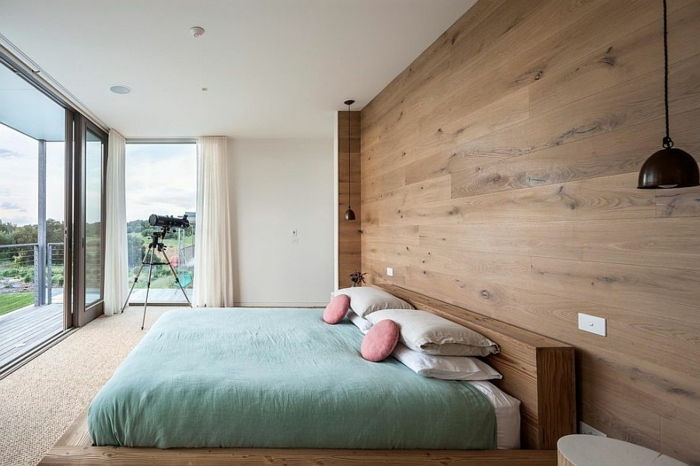 miegamojo dizainas-idėjos-medinis-sienų-ir-modernios-lovų