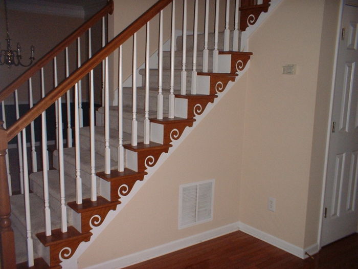en dekorasjon som bølger på kantene i brun farge - trapp ideer