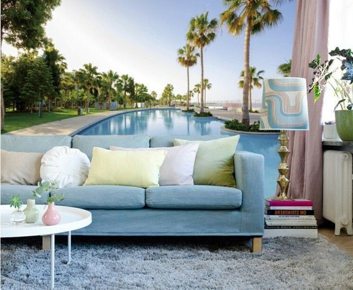 Unik foto tapet med Exotic-sak-unikales-stue-blå-sofa