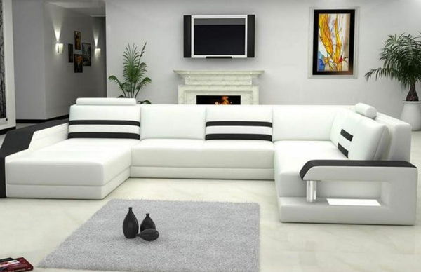 balta spalva-už-kampe-sofa-viršeliai-labai modernus dizainas-su televizoriumi ant sienos
