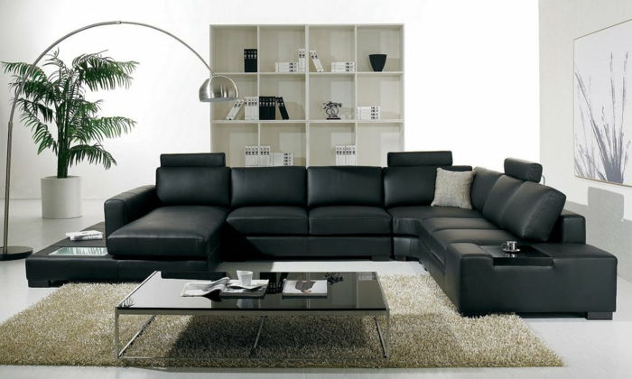 gyvenamasis kambarys stiliaus juoda odinė sofa