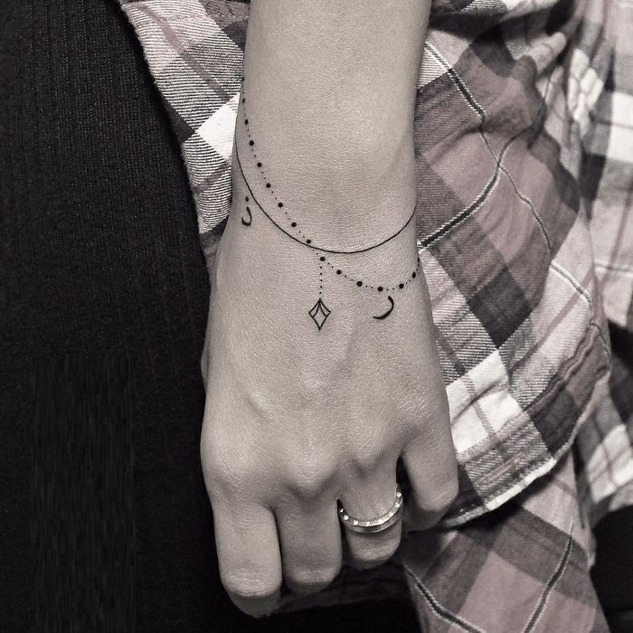 anbud tatoveringer-for-kvinner Armbånd Tattoo