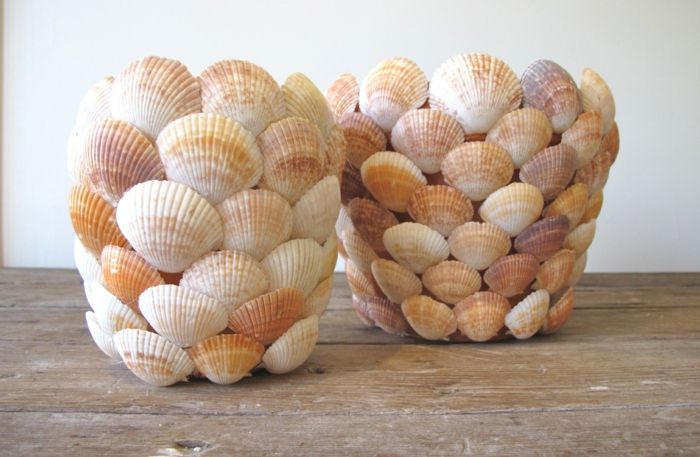 blomkrukor dekorerar lerkrukor från musslor så sommaren är alltid hemma